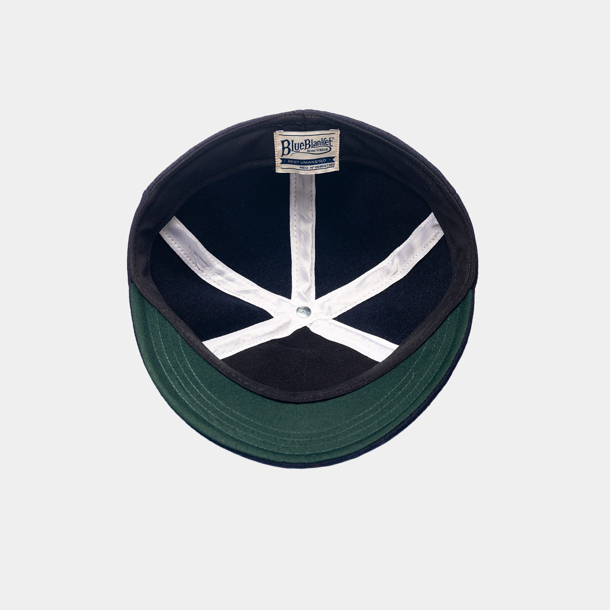 Close-up of the handcrafted Blue Blanket BB Wool Cap, inspired by early 1900s baseball and workwear.
