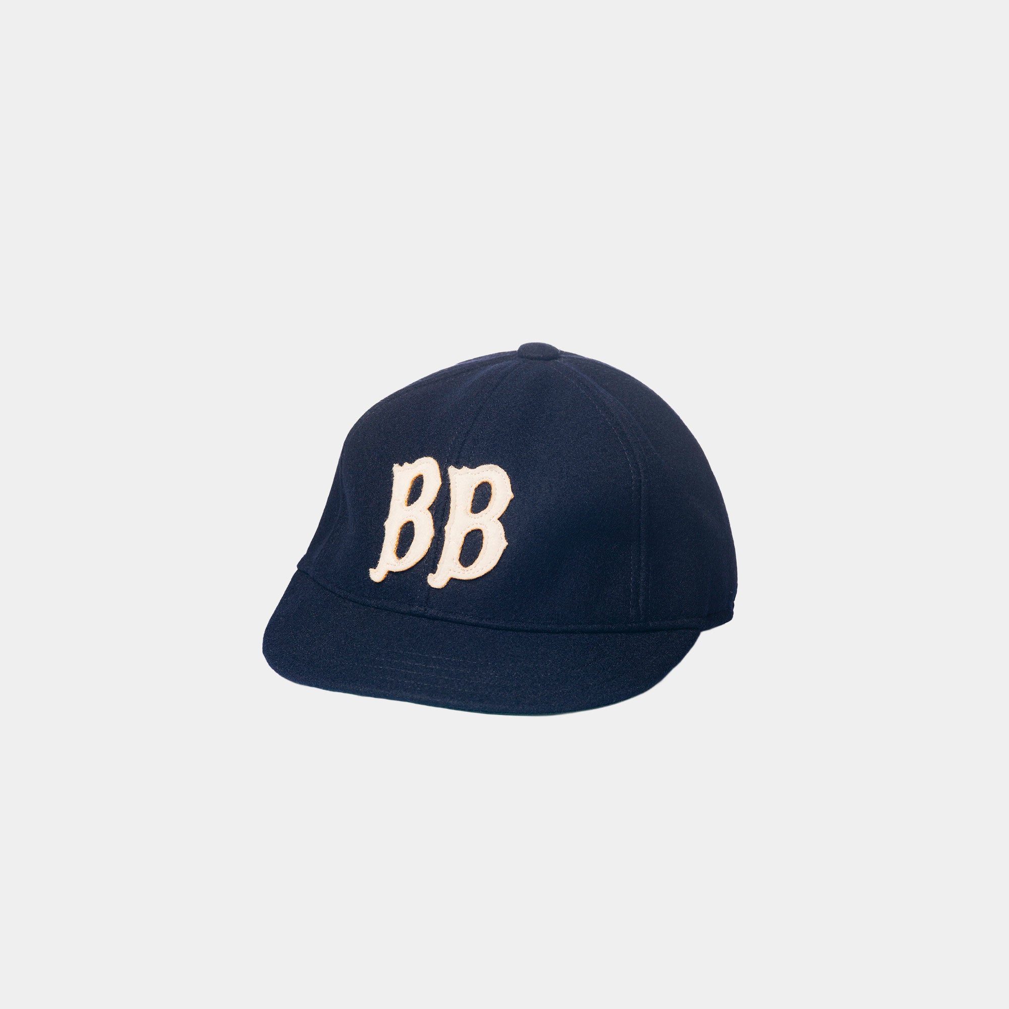 Blue Blanket BB Wool Cap in navy wool with cream felt letters “BB”, vintage workwear style.