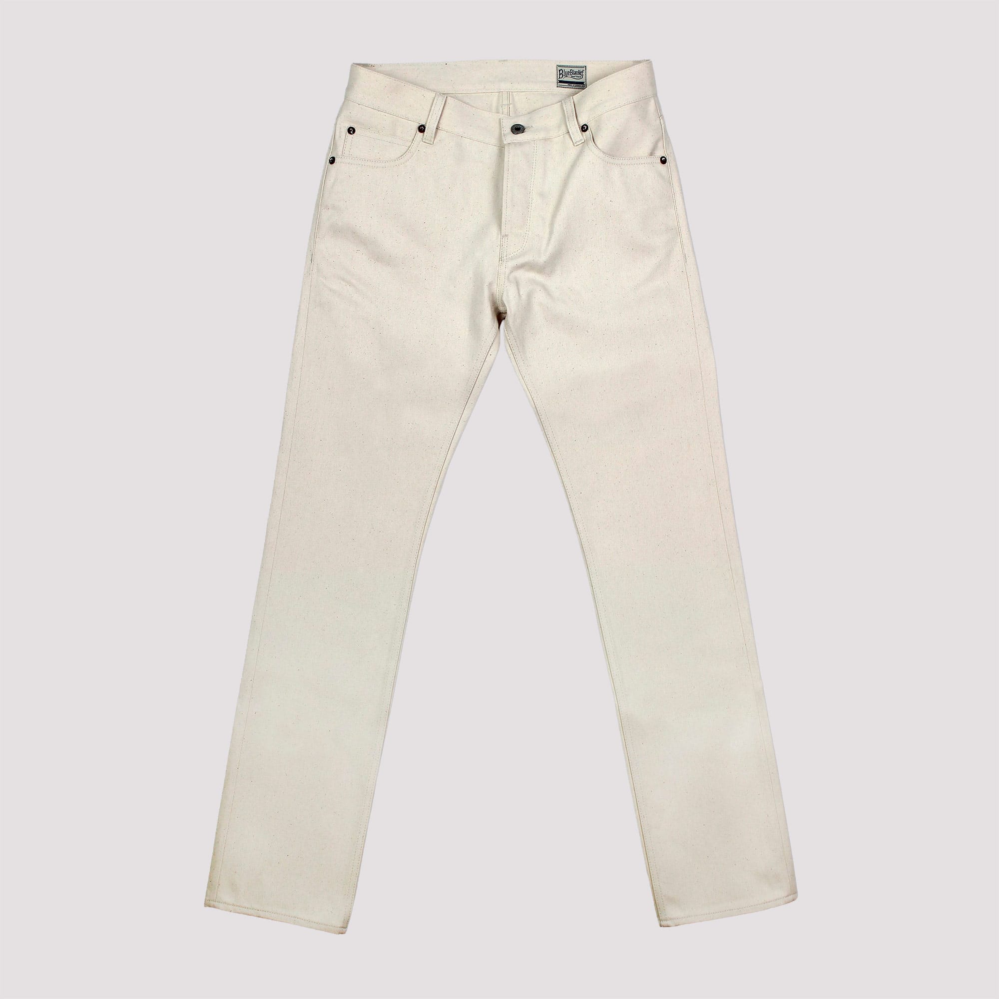 Beige jeans on a light gray background